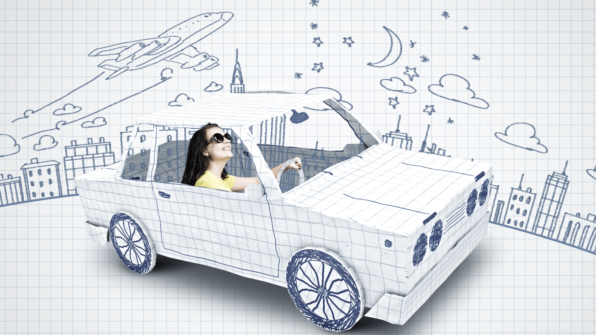 女性ペーパードライバーがペーパーの車にのって運転している